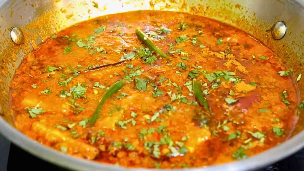 Step 18: Add coriander and green chillies